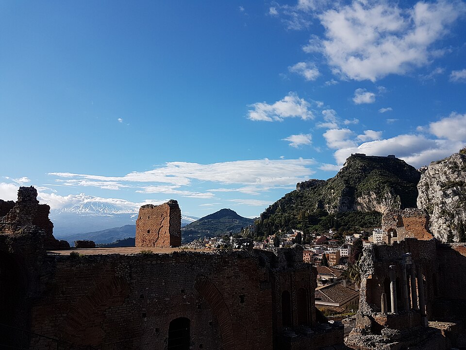 The Greek theatre at Taormina with Mount Etna behind